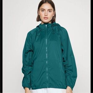 ATHLETA SUPSERSET JACKET IN BOREALIS TEAL GREEN